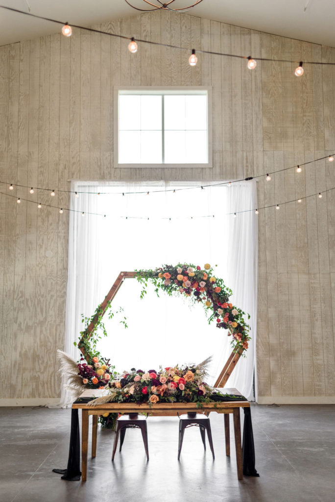 Amazing arch reused behind a head table