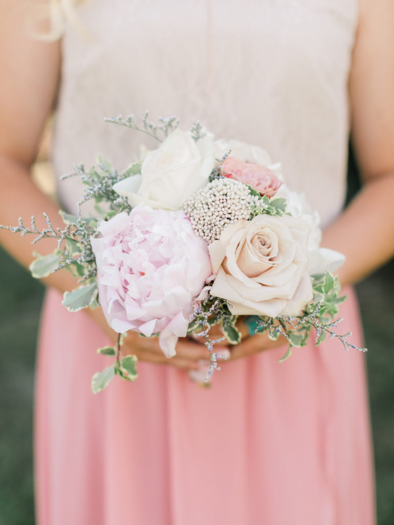 Seasonal bridesmaid bouquet Featuring roses and pink peony